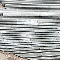 Liniaire grastegel grijs